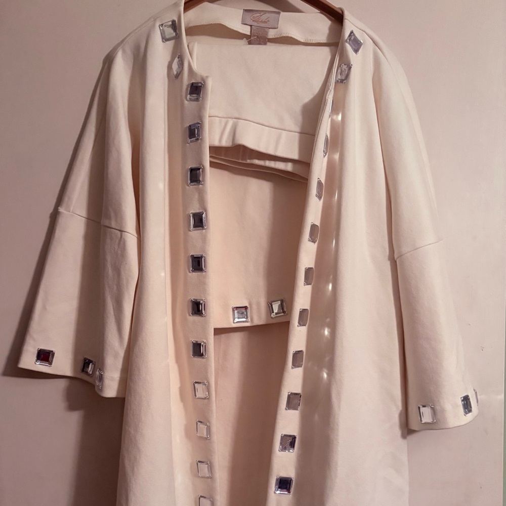 Elegant Cream Jacket and Skirt with Gemstone Accents